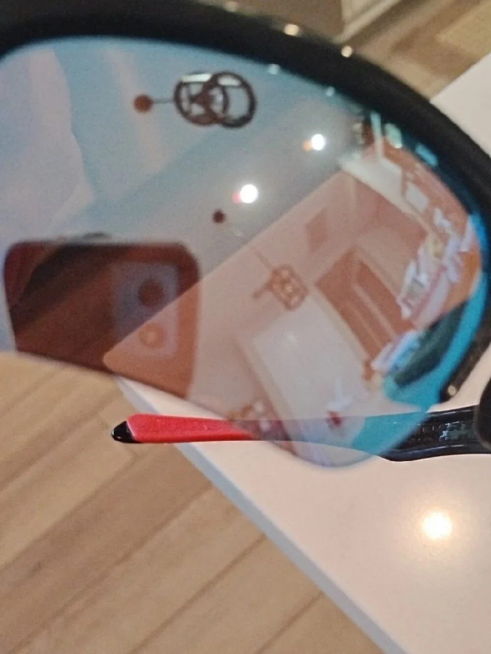 Oakley Youth Quarter Jacket Black with Red Temple Tips and Blue Mirror Lenses